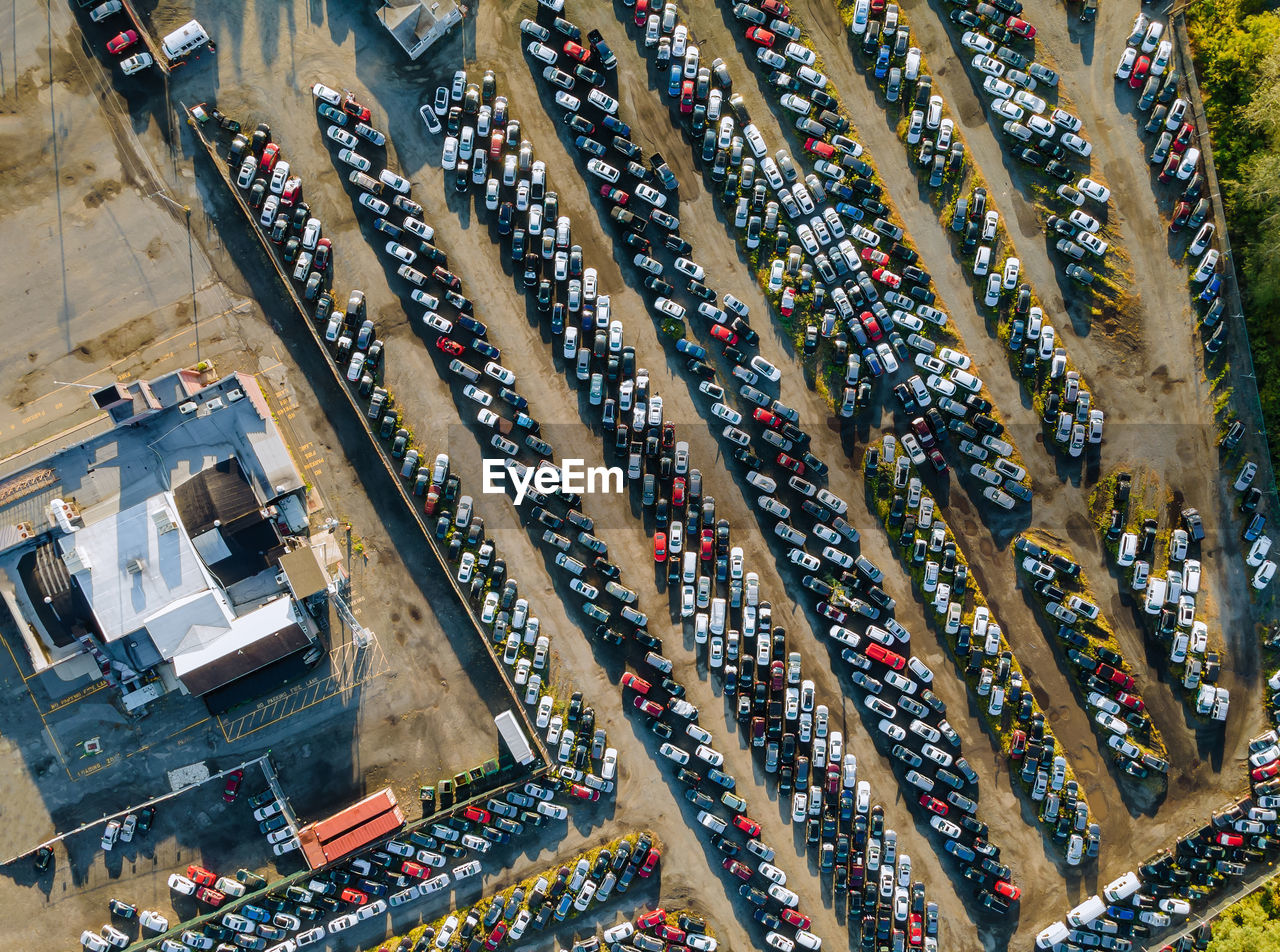 HIGH ANGLE VIEW OF GROUP OF PEOPLE IN MARKET