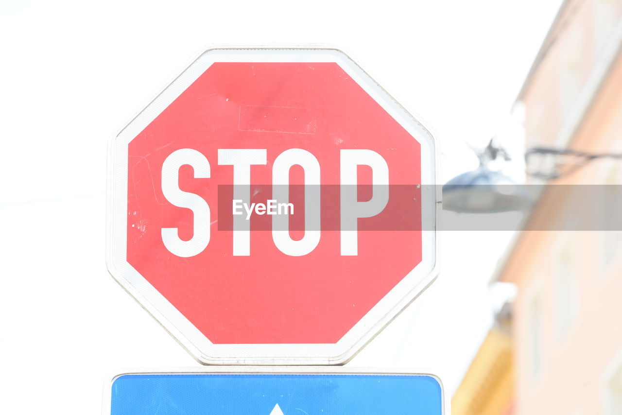 sign, stop sign, communication, road sign, red, text, road, guidance, warning sign, traffic sign, transportation, no people, western script, close-up, white, stop - single word, symbol