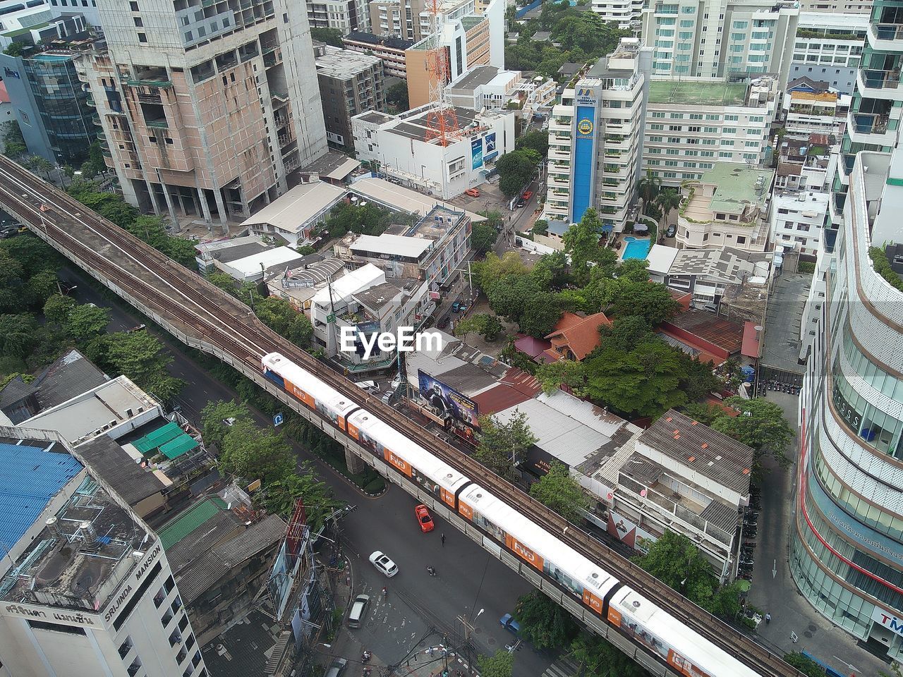 HIGH ANGLE VIEW OF CITYSCAPE AND ROAD