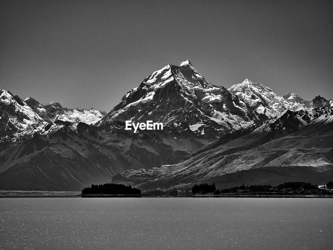 Scenic view of snowcapped mountains against sky during winter