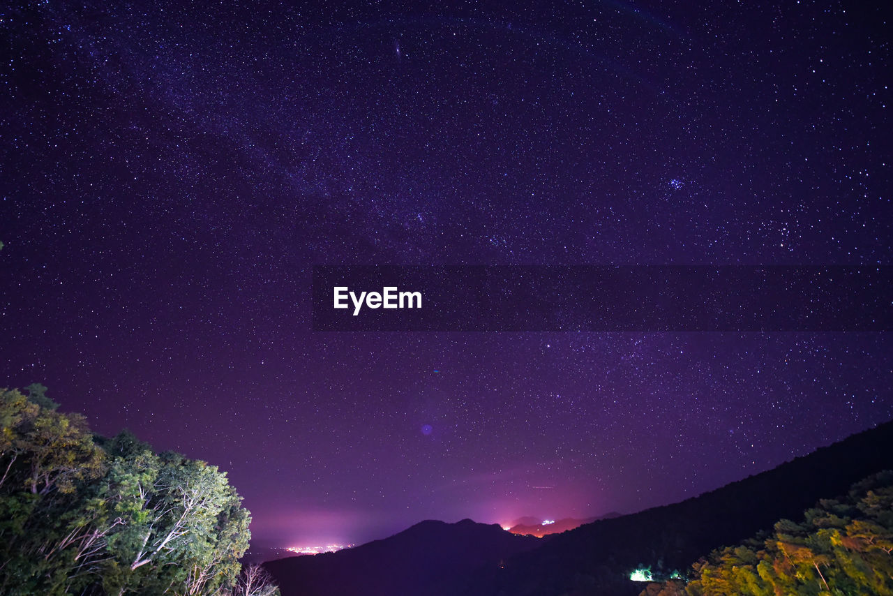 Low angle view of stars against sky at night