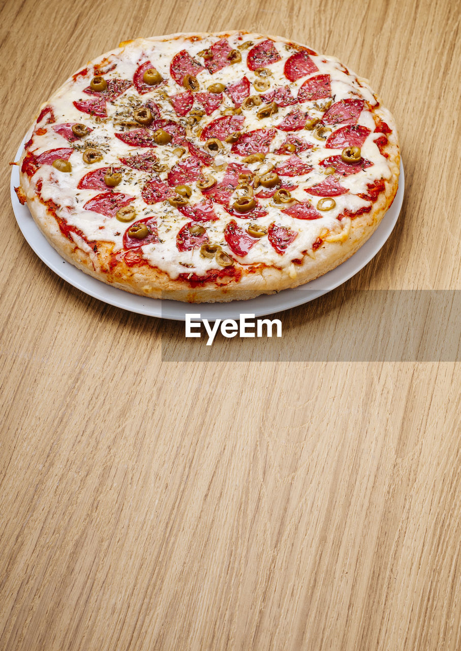 High angle view of pizza on table