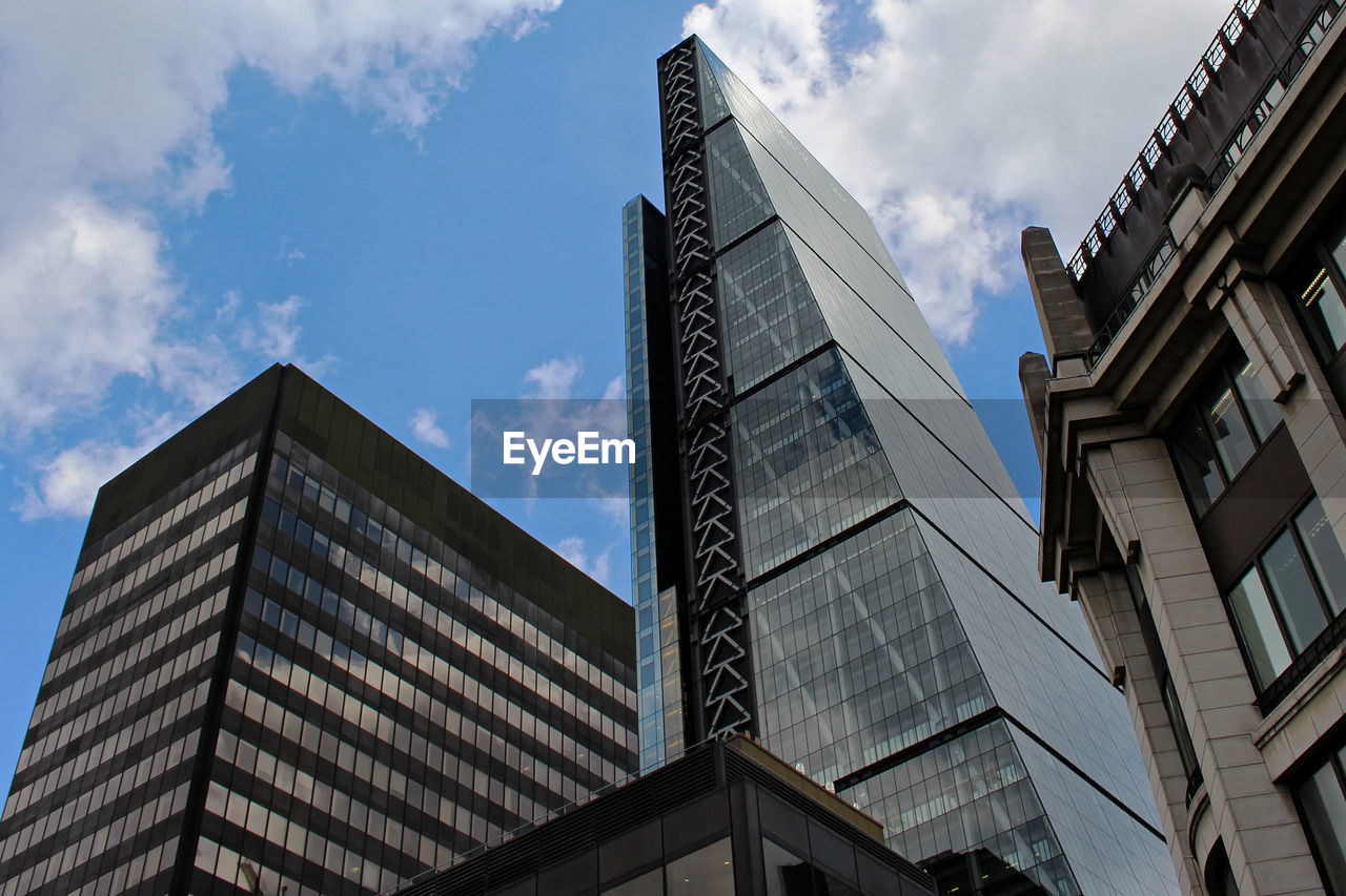 Low angle view of modern buildings against sky