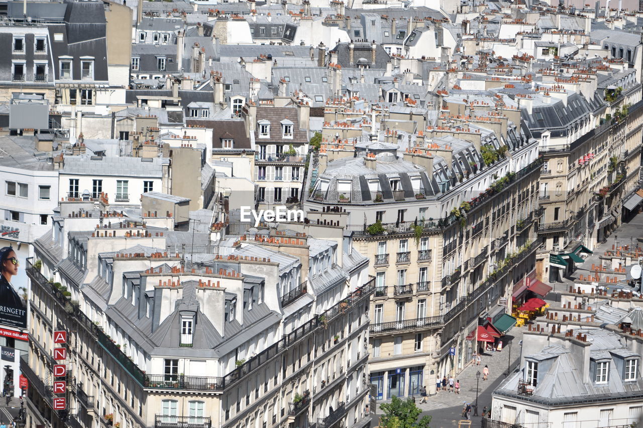 High angle view of street amidst buildings in town