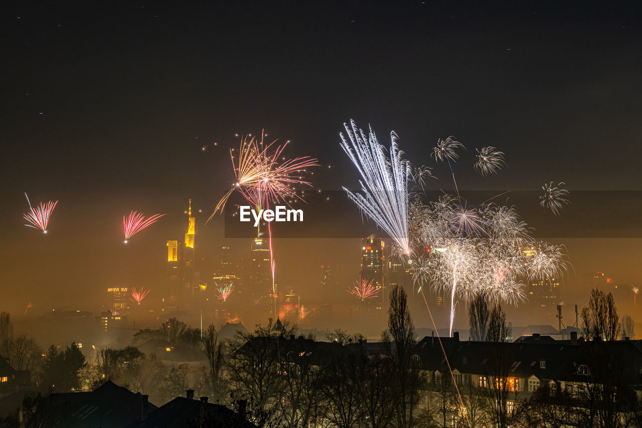 The frankfurt skyline with firework at new years eve