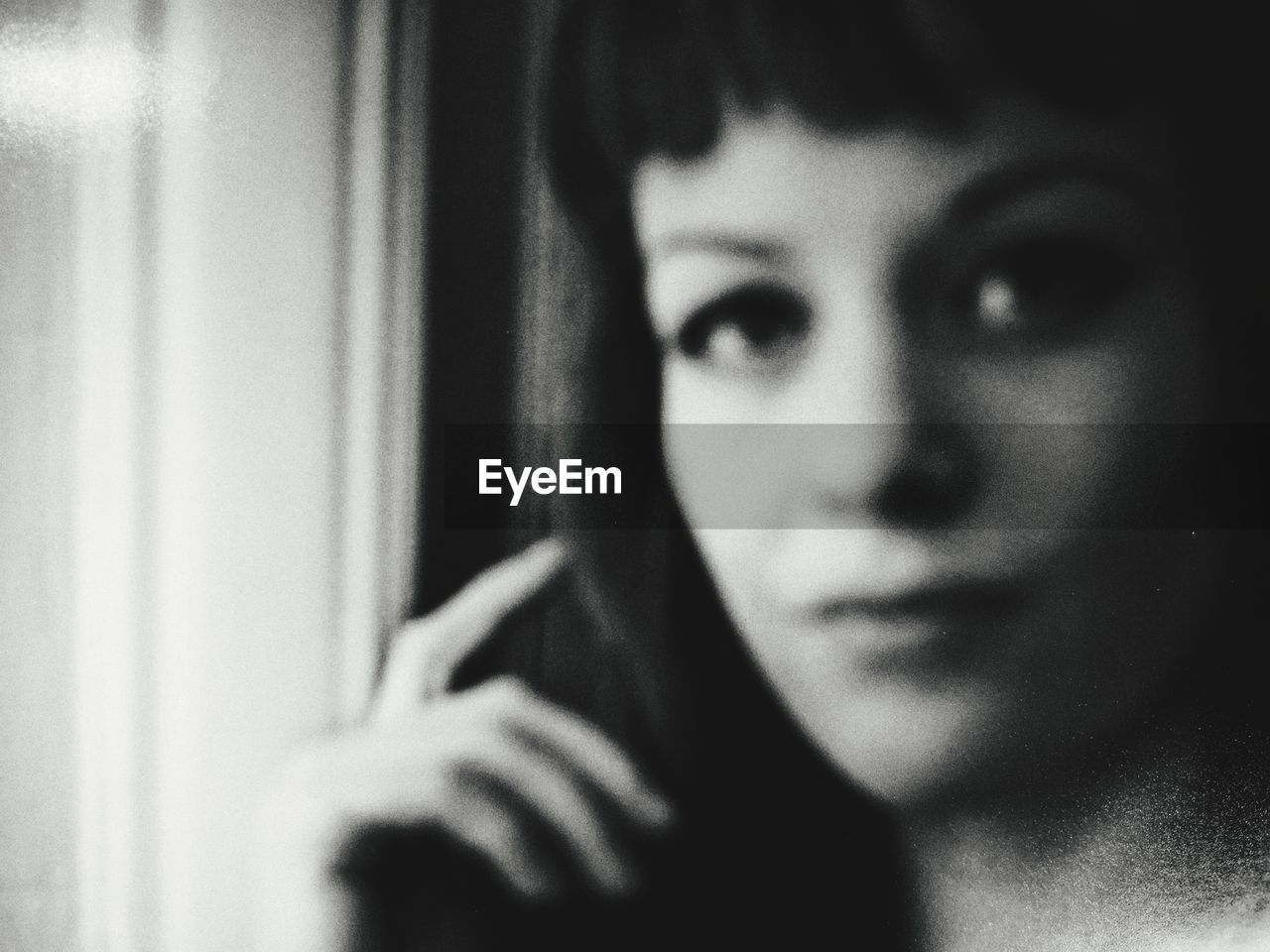 CLOSE-UP PORTRAIT OF YOUNG WOMAN WITH HAIR