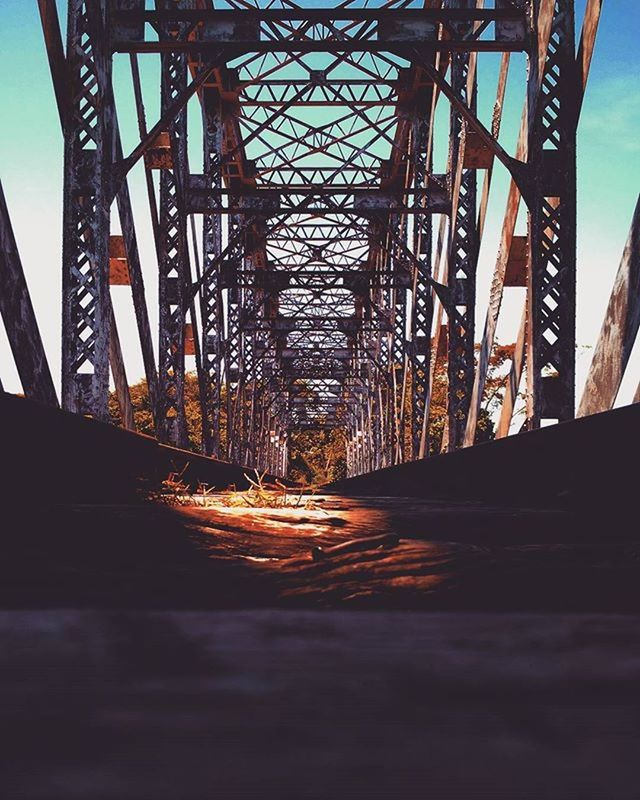 LOW ANGLE VIEW OF BRIDGE WITH BRIDGE