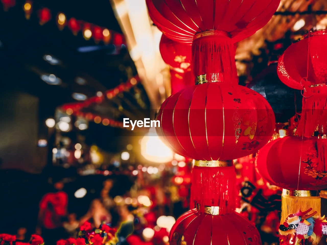 Close-up of illuminated chinese lanterns hanging at night