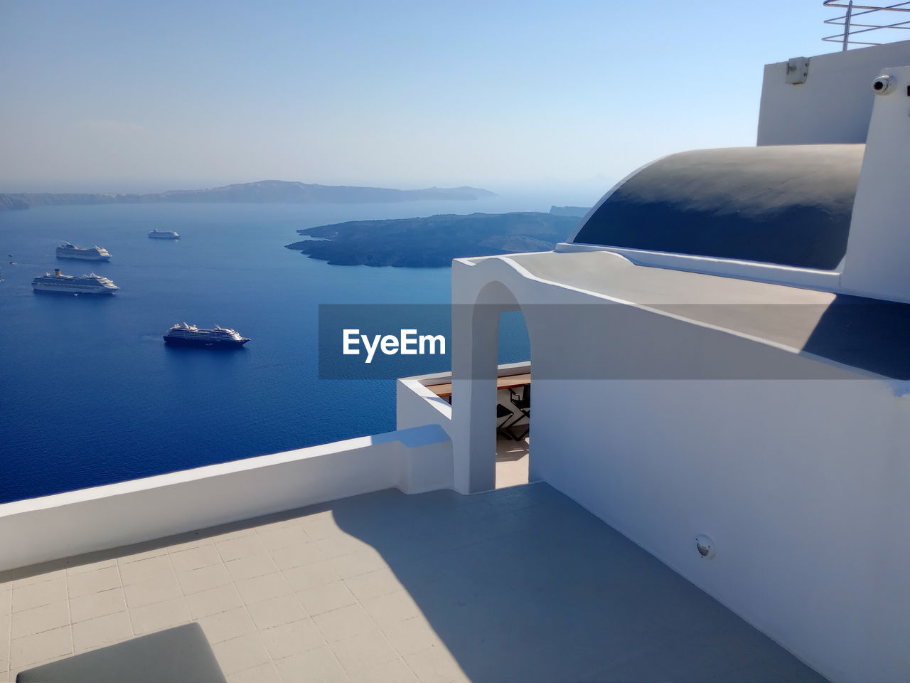 Scenic view of terrace and sea against sky