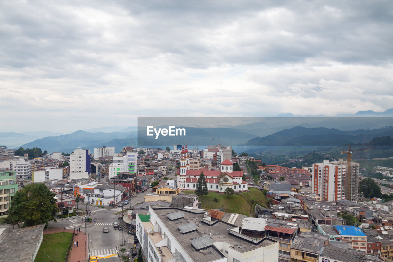 AERIAL VIEW OF CITY AGAINST SKY