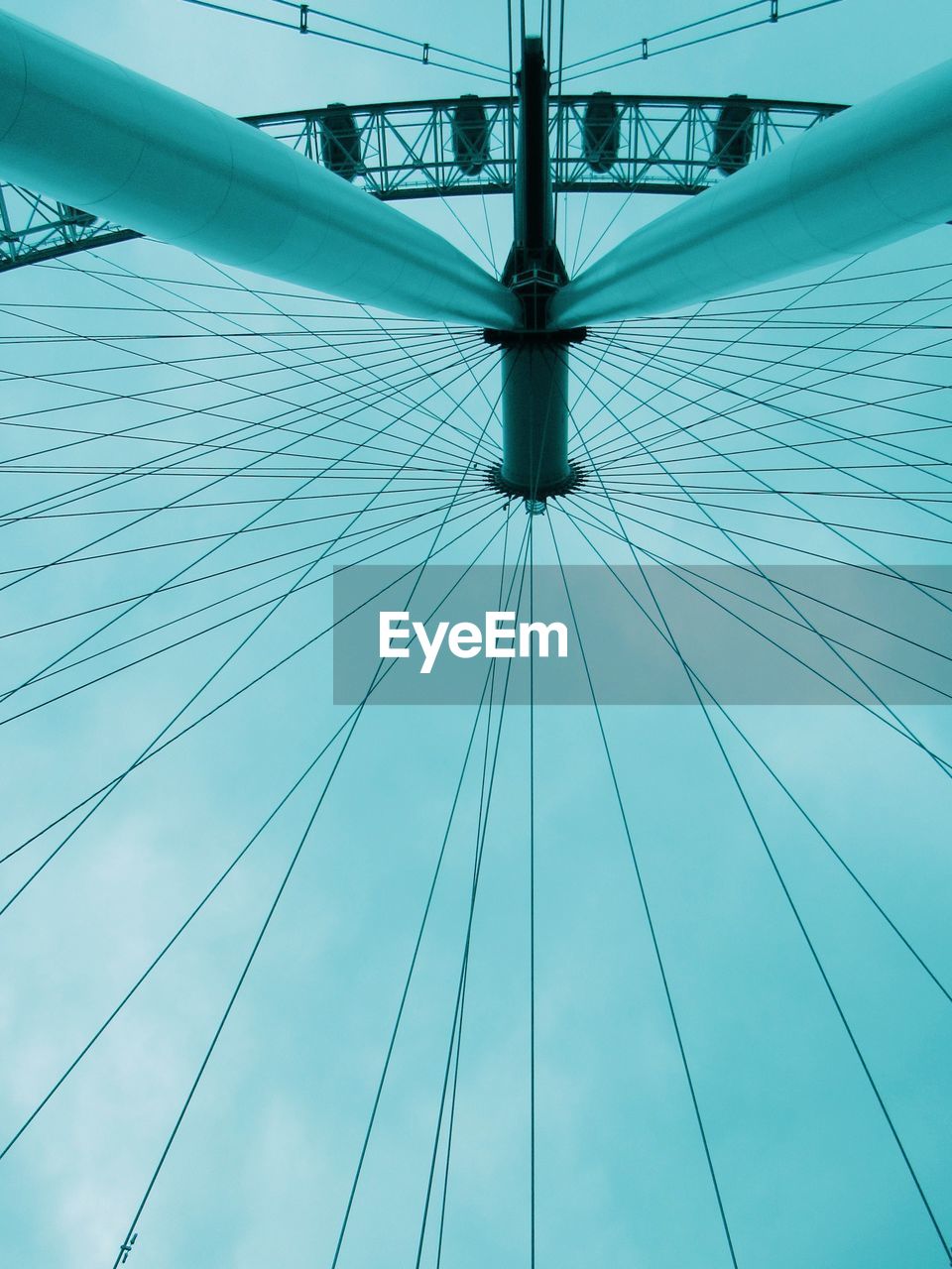 Low angle view of the london eye against sky