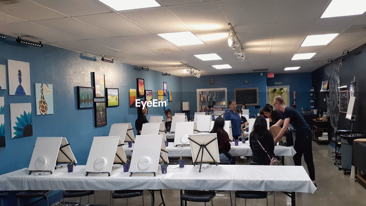 GROUP OF PEOPLE WAITING IN OFFICE