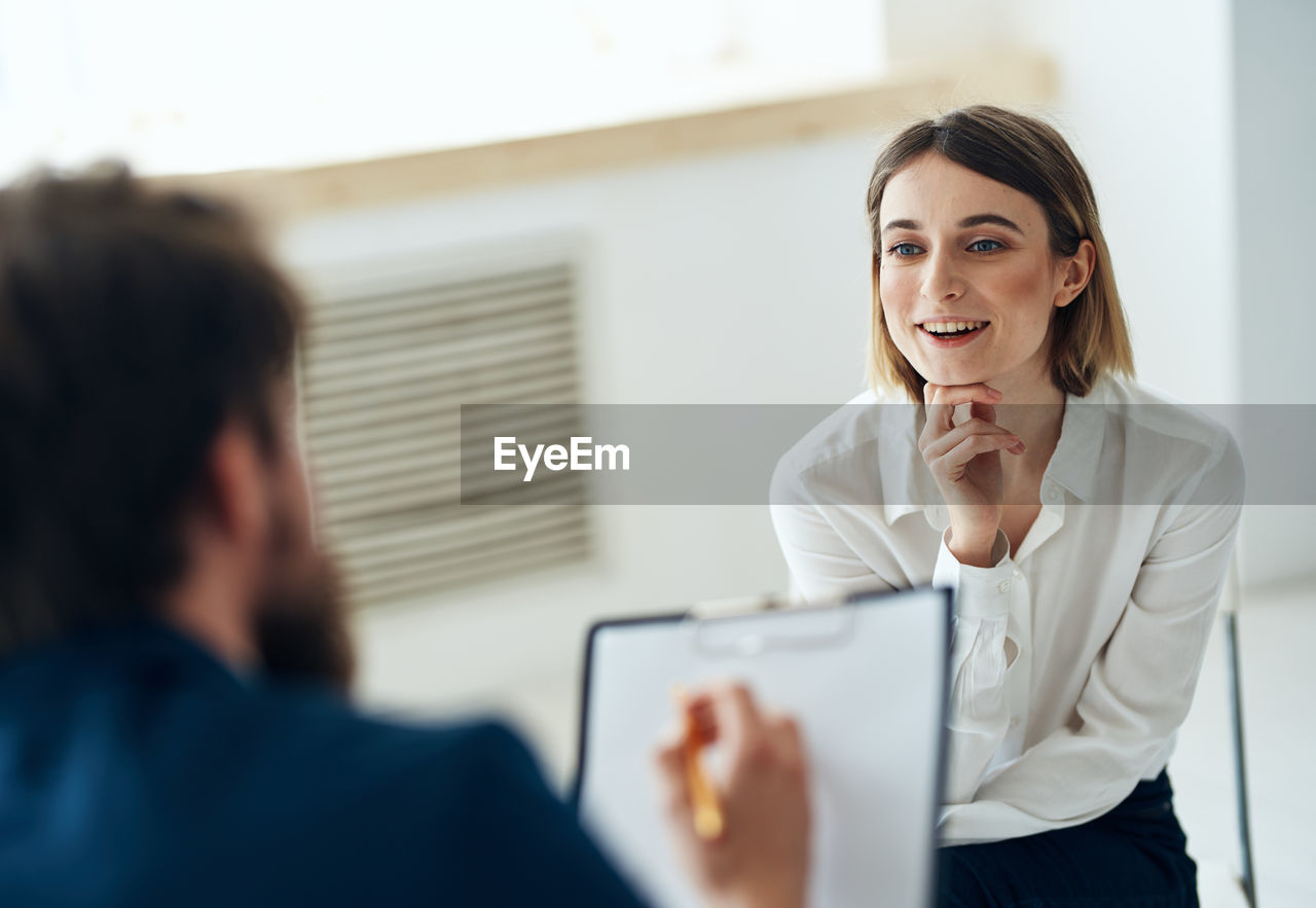 portrait of young businesswoman working at office