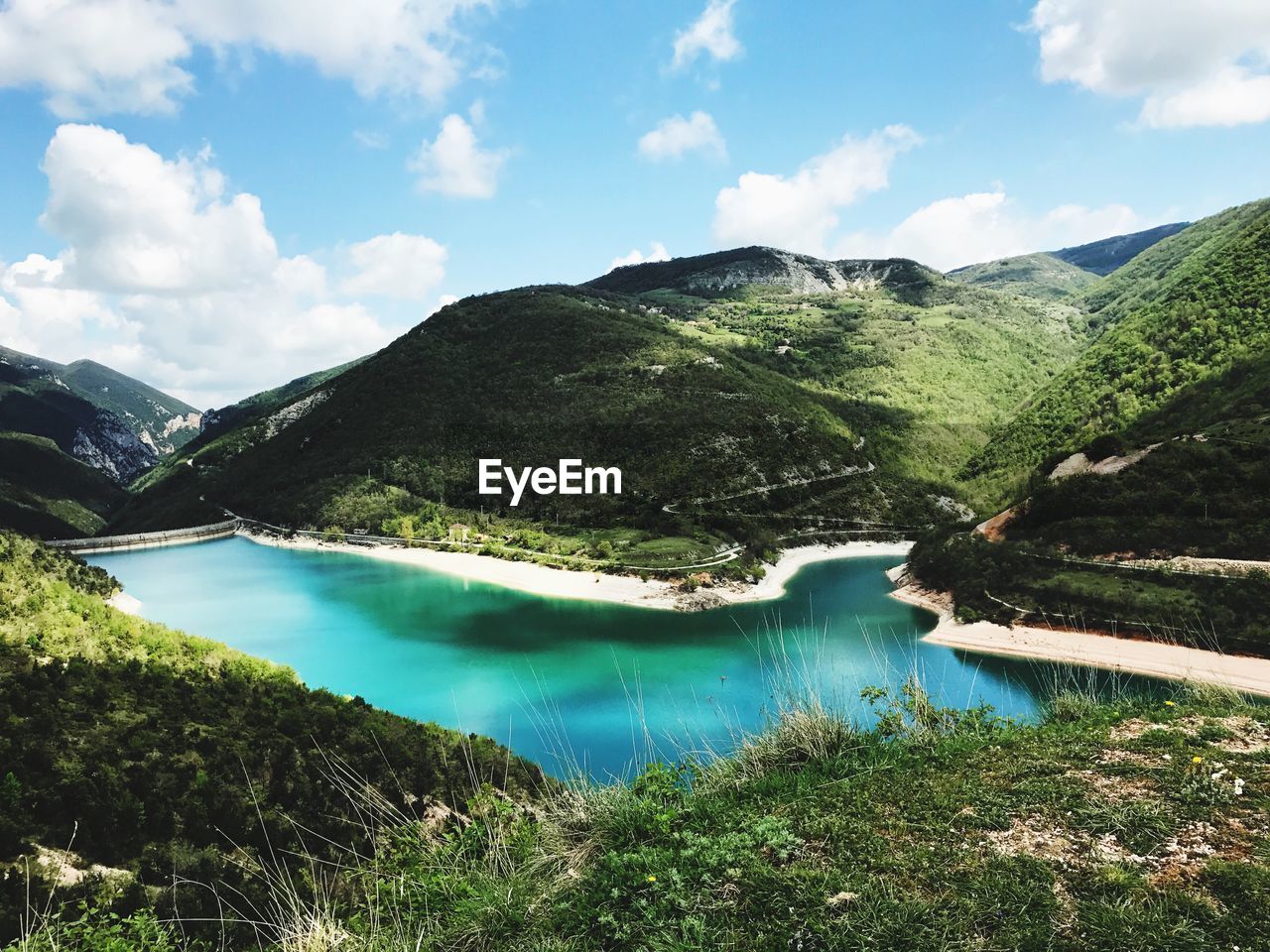 Scenic view of lake and mountains in italy