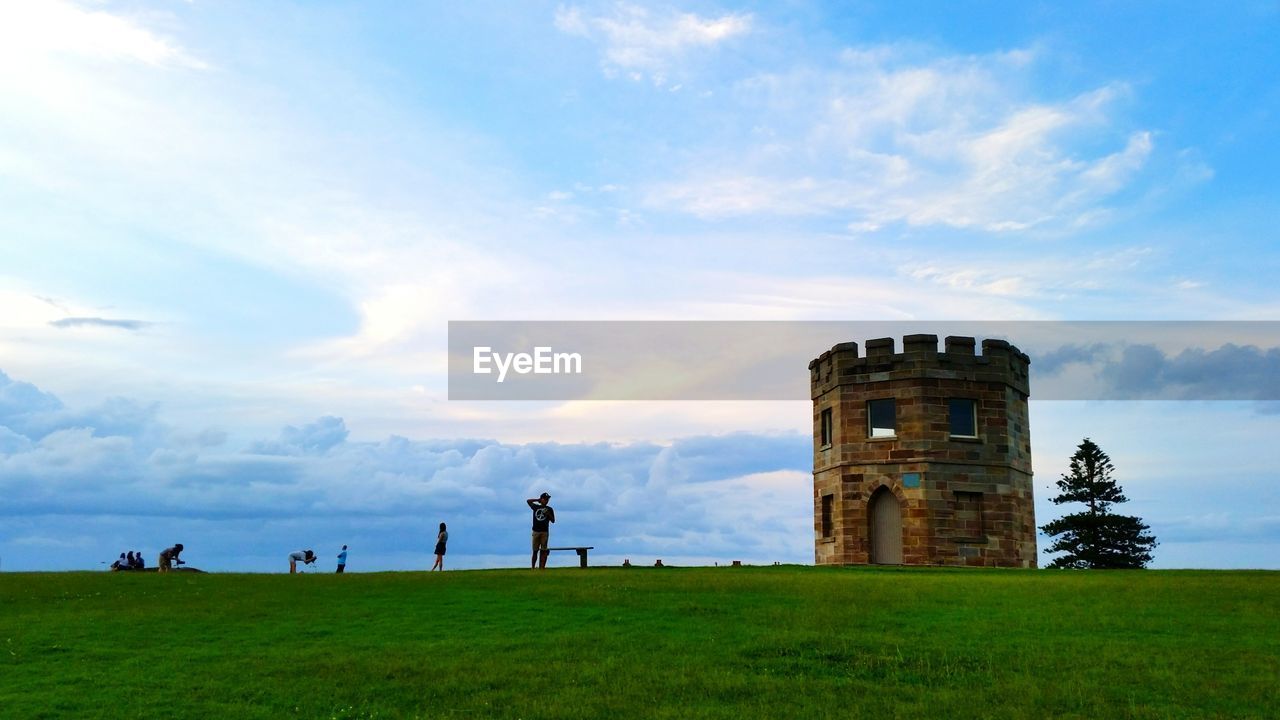 Historic building against cloudy sky