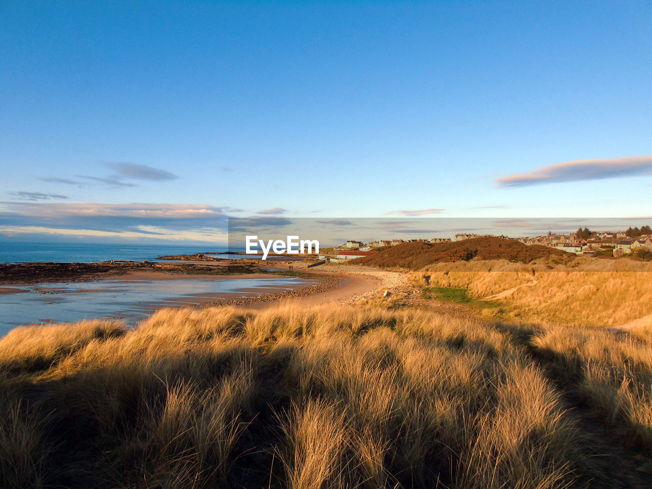Scenic view of lossiemouth beach and sea against sky