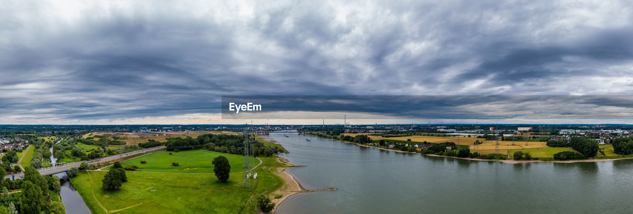 Panoramic view of the rhine and the a1 motorway bridge near leverkusen, germany. drone photography.