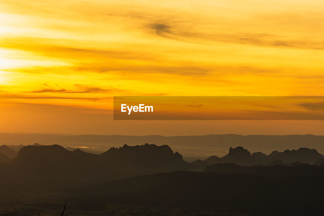 SCENIC VIEW OF DRAMATIC SKY DURING SUNSET