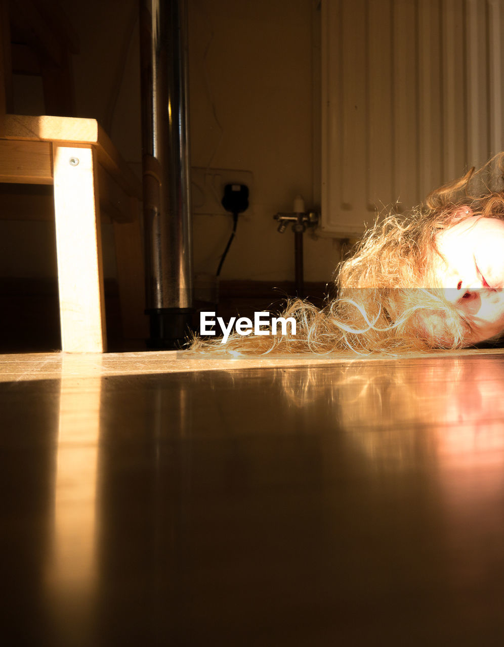 BLURRED MOTION OF PERSON AT ILLUMINATED HOME