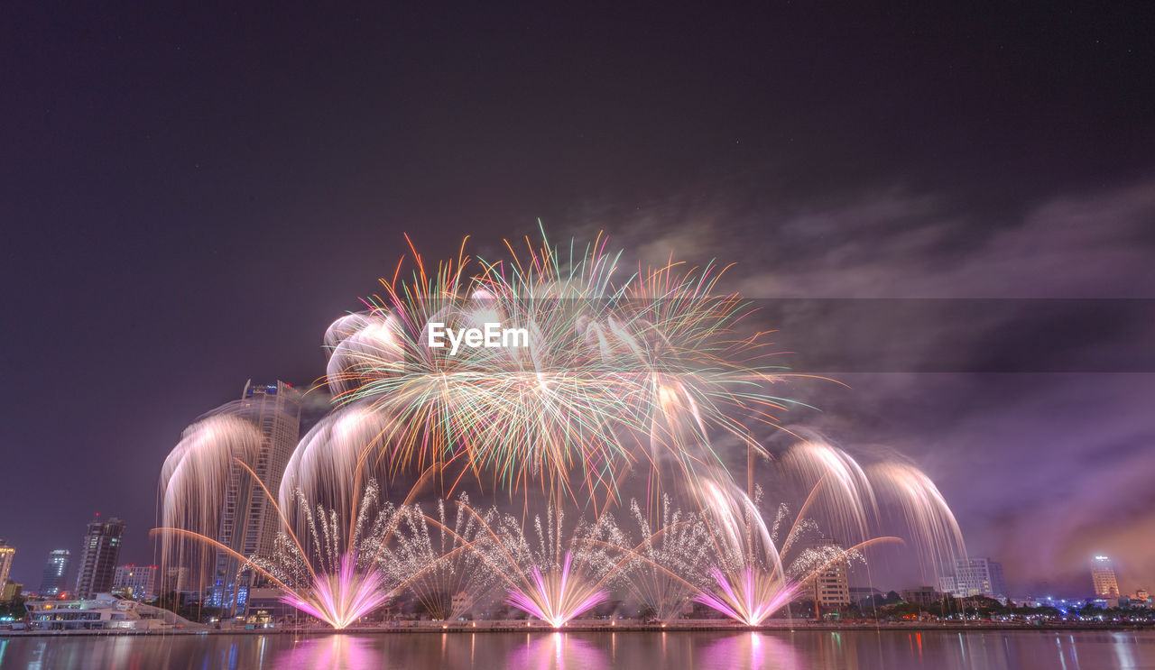 Fireworks against sky at night