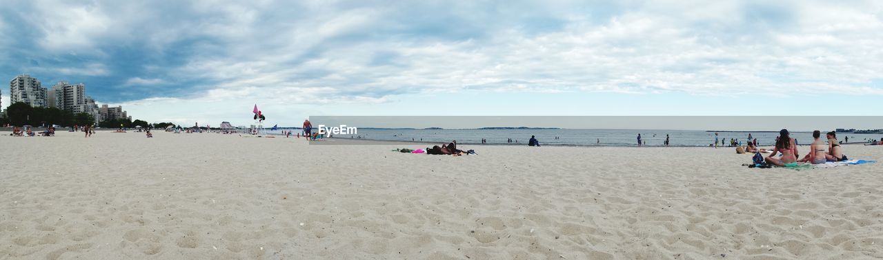 TOURISTS ON BEACH