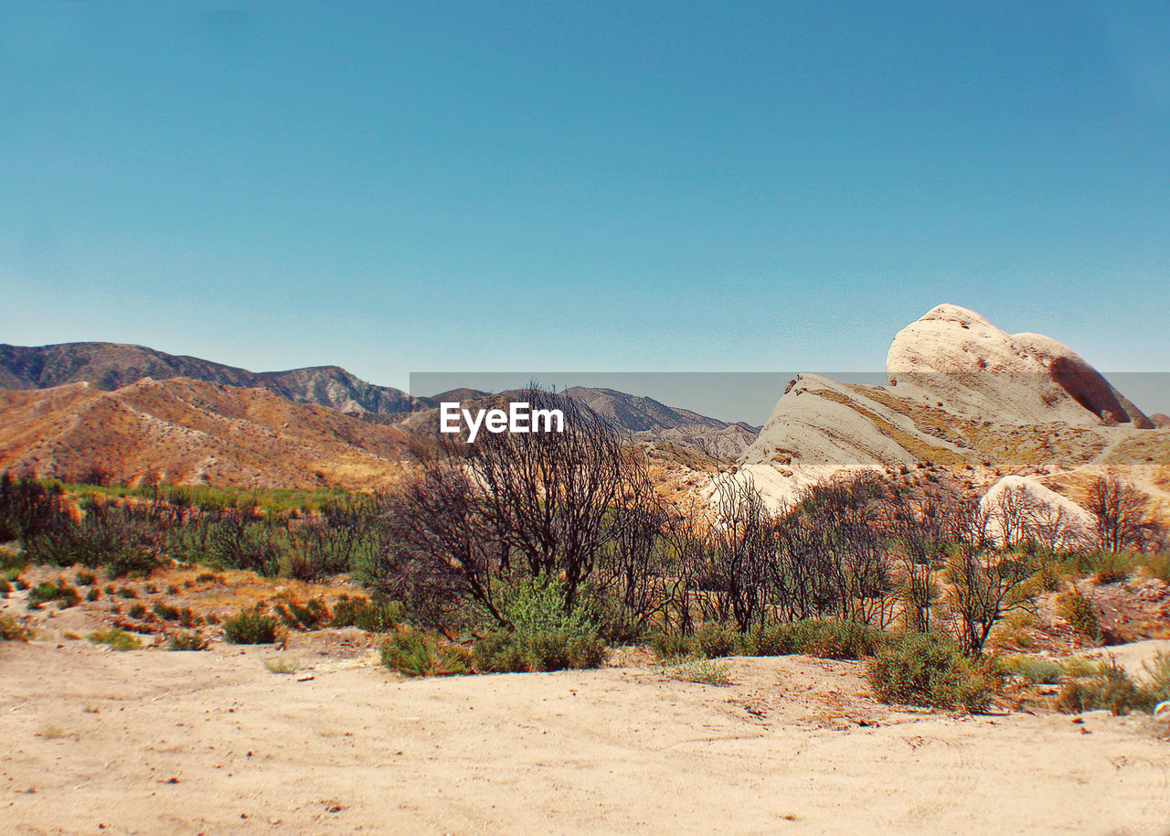 Scenic view of mountains against clear sky