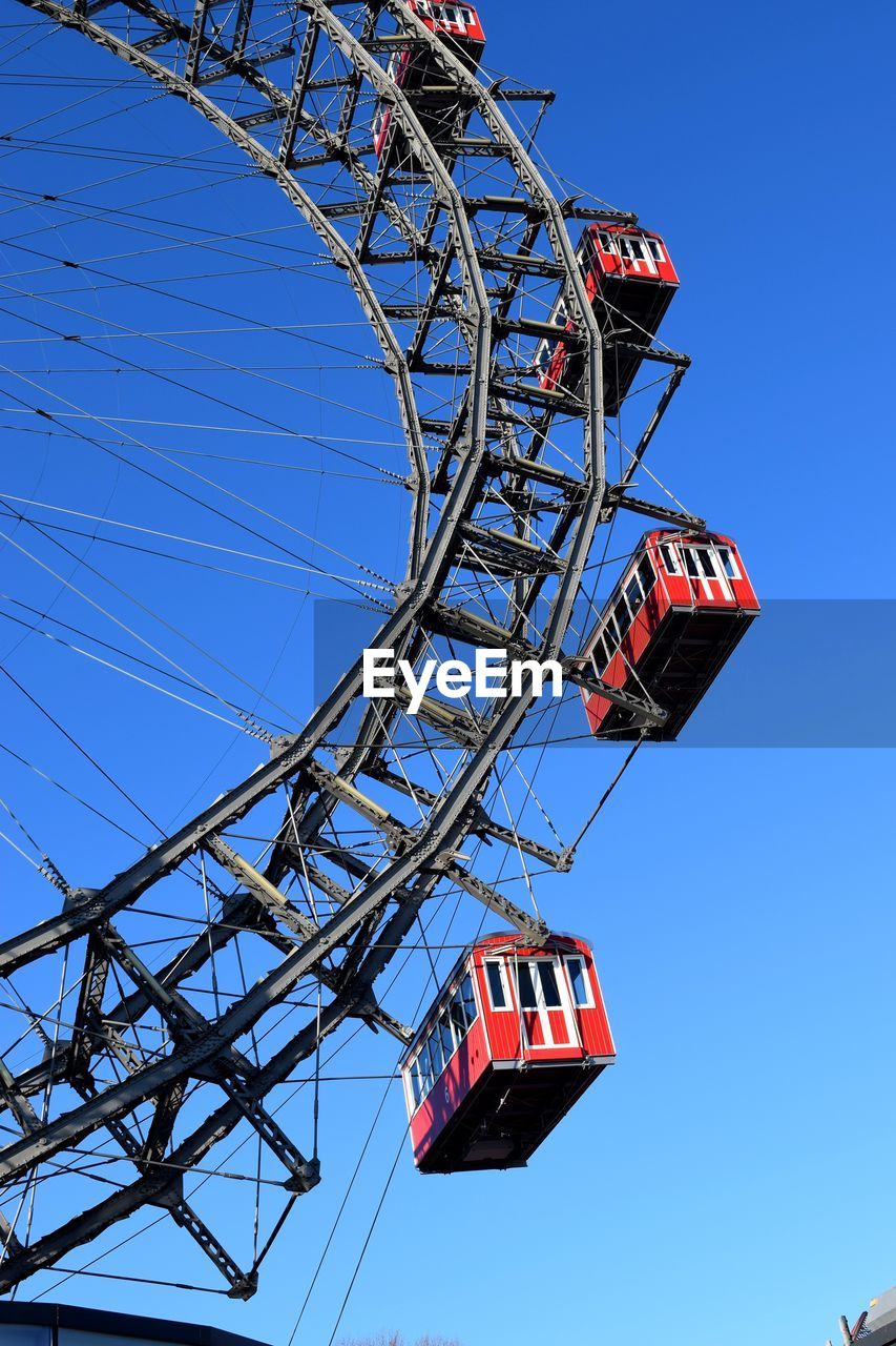 LOW ANGLE VIEW OF FERRIS WHEEL AGAINST SKY