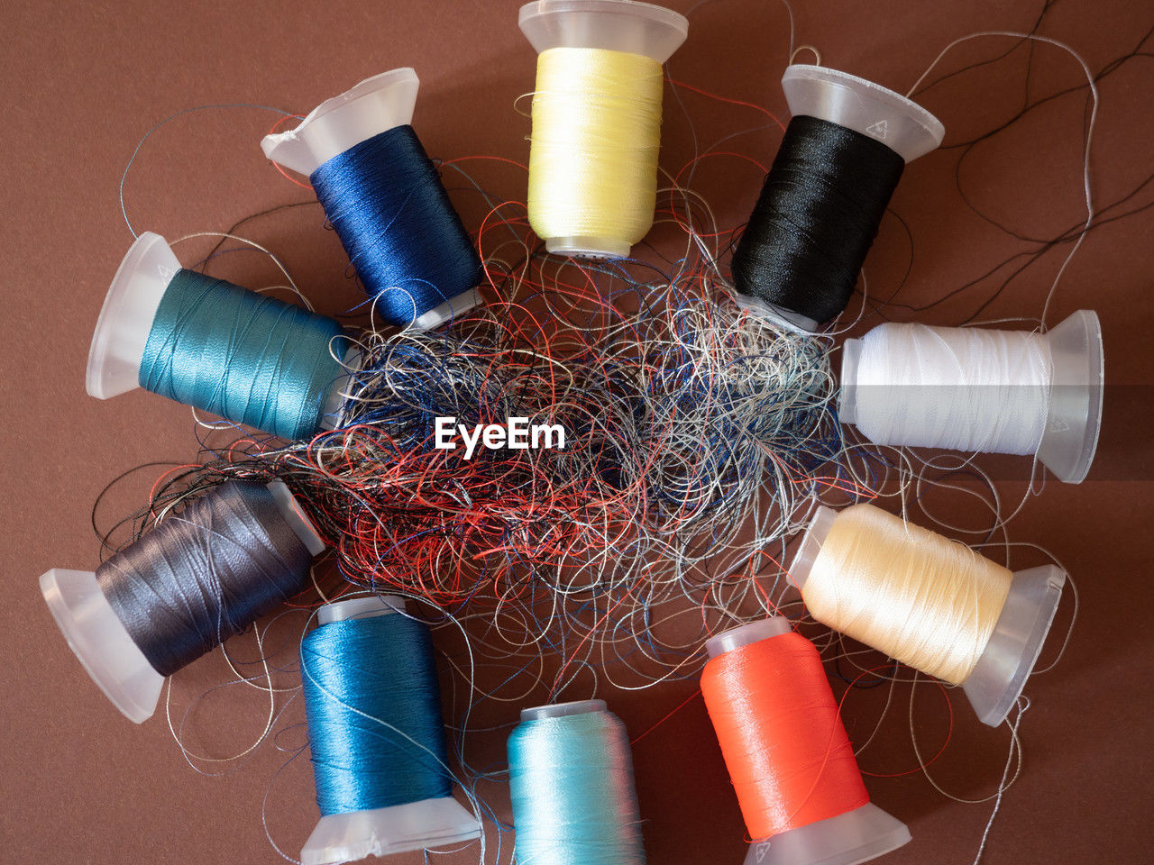 high angle view of multi colored spools