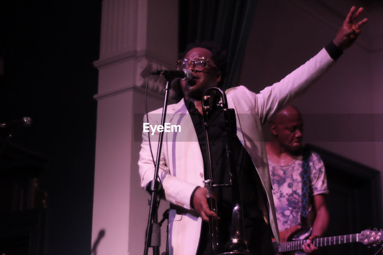 YOUNG MAN PLAYING WITH MUSIC CONCERT