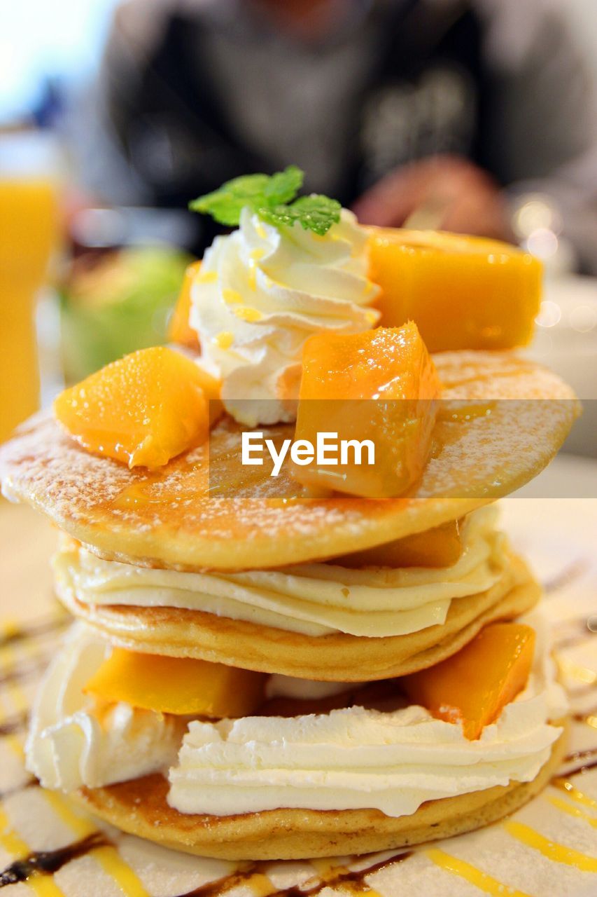 Close-up of fresh mango desert on table