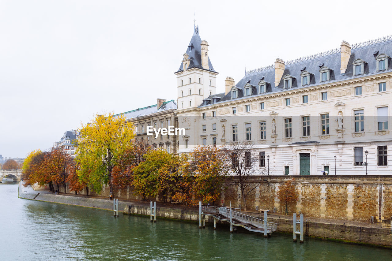 VIEW OF BUILDING BY RIVER