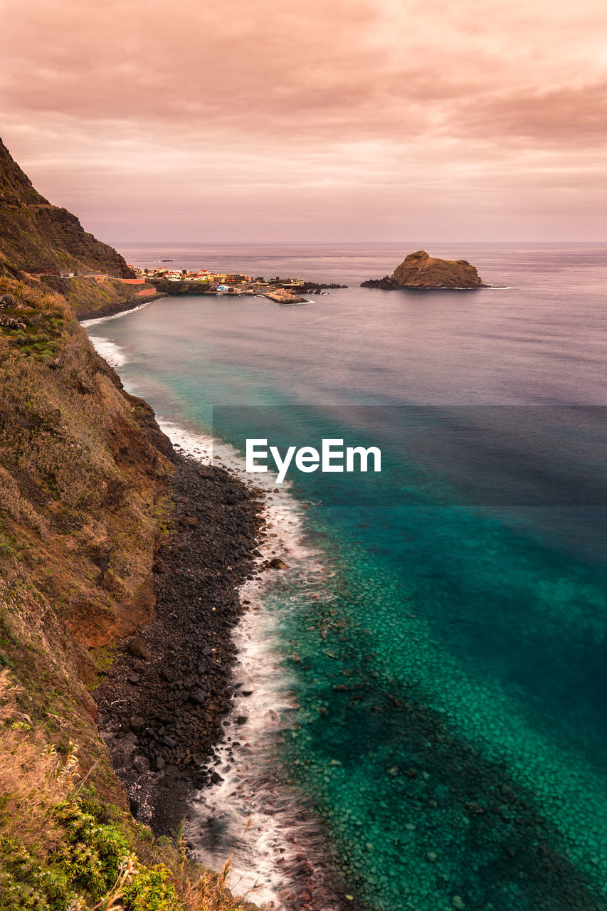 Scenic view of sea against sky during sunset