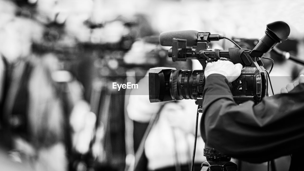 Cameras at a live media conference.