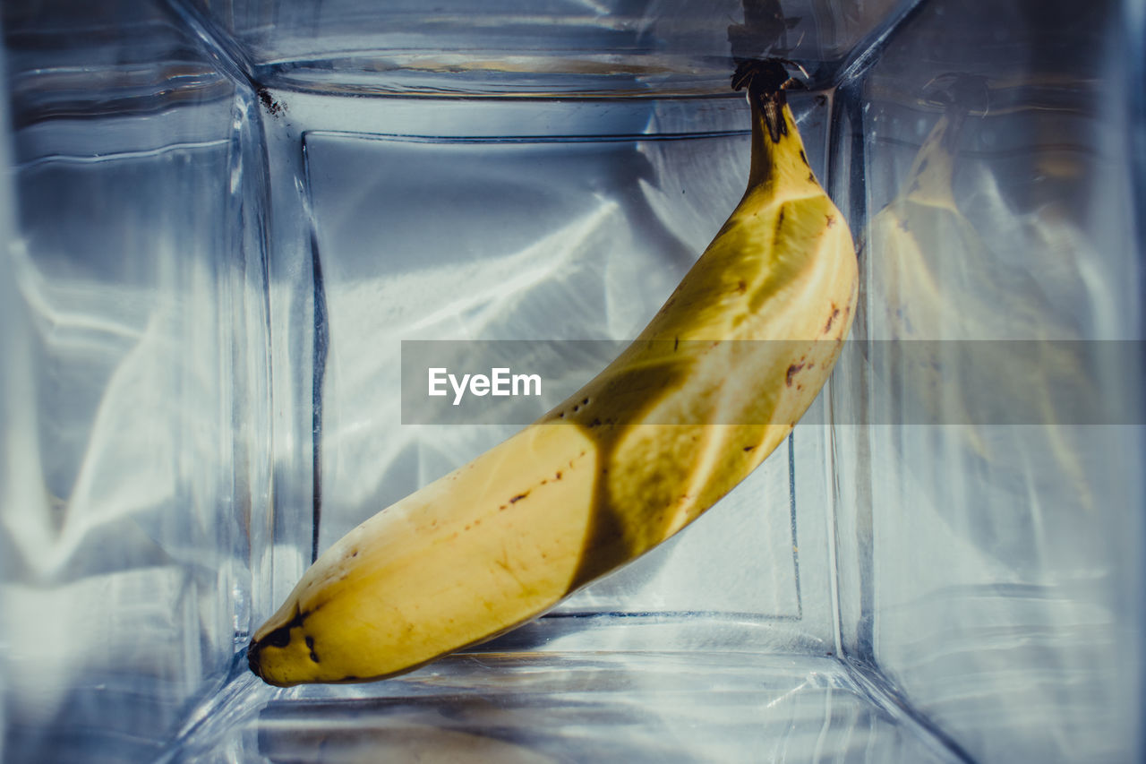 Banana in glass container