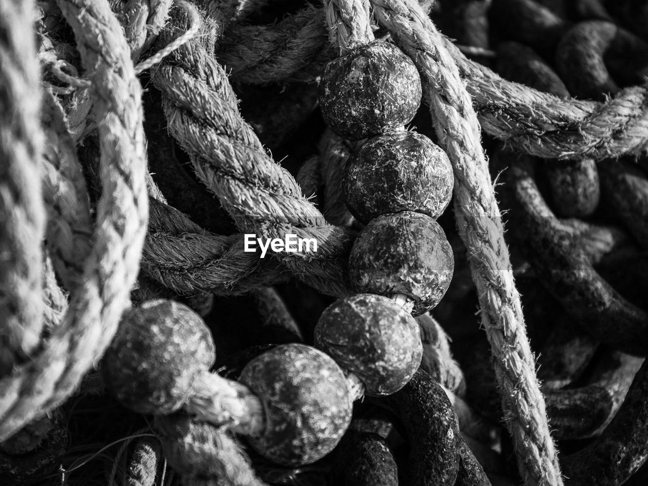 Close-up of ropes and buoys