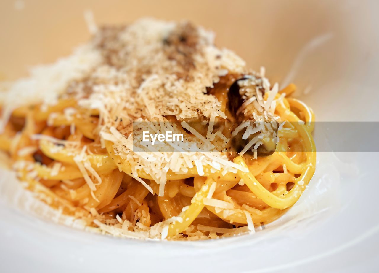 Delicious pasta dish carbonara. the sauce is obtained by mixing eggs,