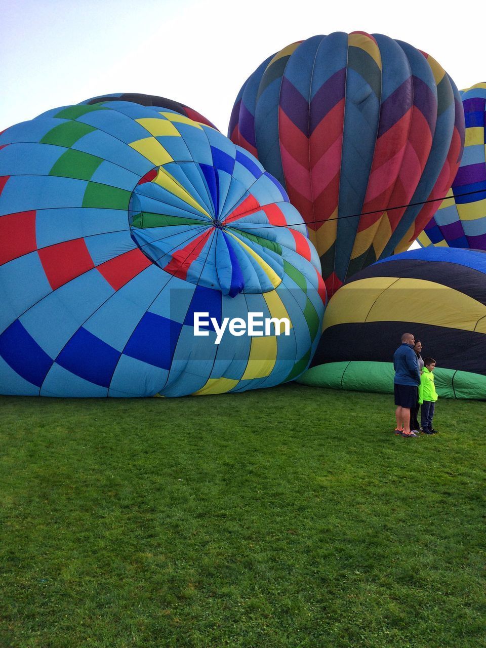 REAR VIEW OF MAN HOT AIR BALLOON