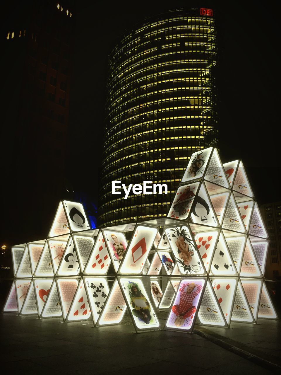 LOW ANGLE VIEW OF ILLUMINATED MODERN BUILDING