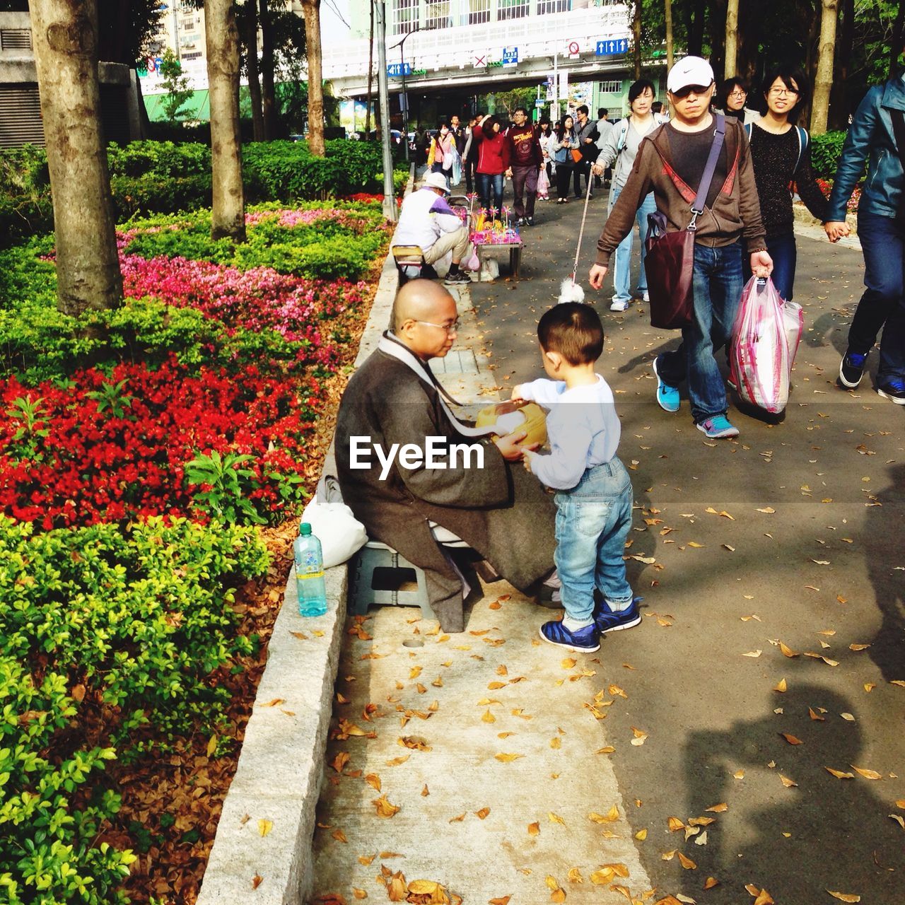 TWO CHILDREN PLAYING IN PARK