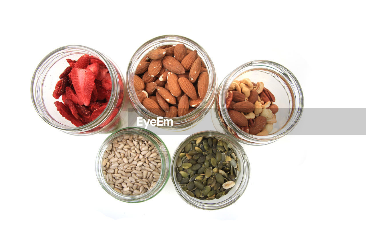 white background, food and drink, food, variation, studio shot, cut out, container, indoors, no people, produce, healthy eating, jar, wellbeing, freshness, high angle view, still life, directly above, large group of objects, seed