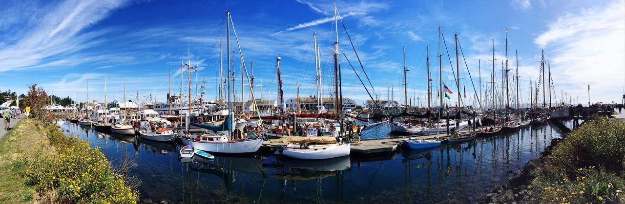 Panoramic view of boats moored at harbor