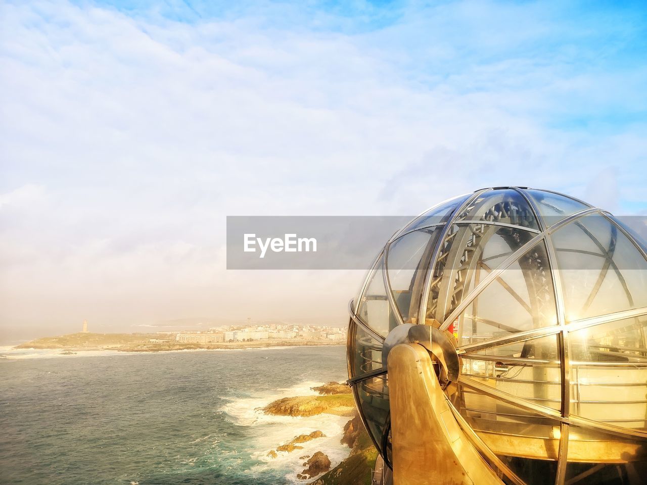 FERRIS WHEEL AGAINST SEA