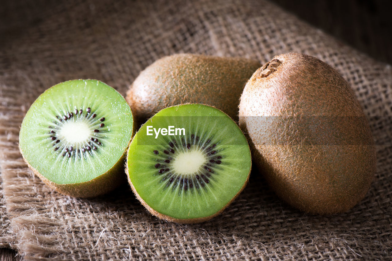 Kiwi fruit on wooden background