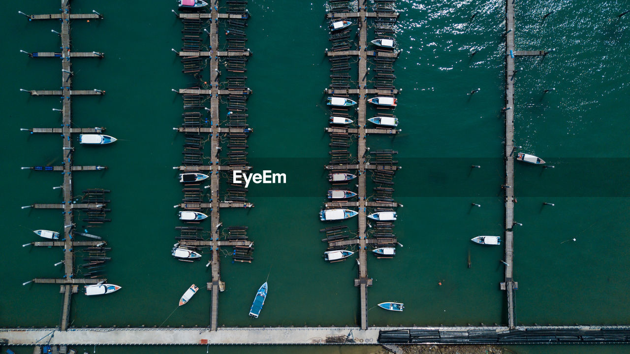 Boats moored in water