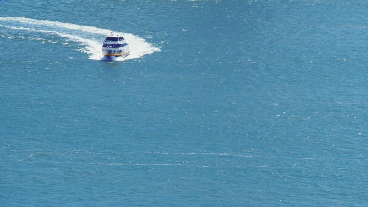 High angle view of cruise ship sailing on sea