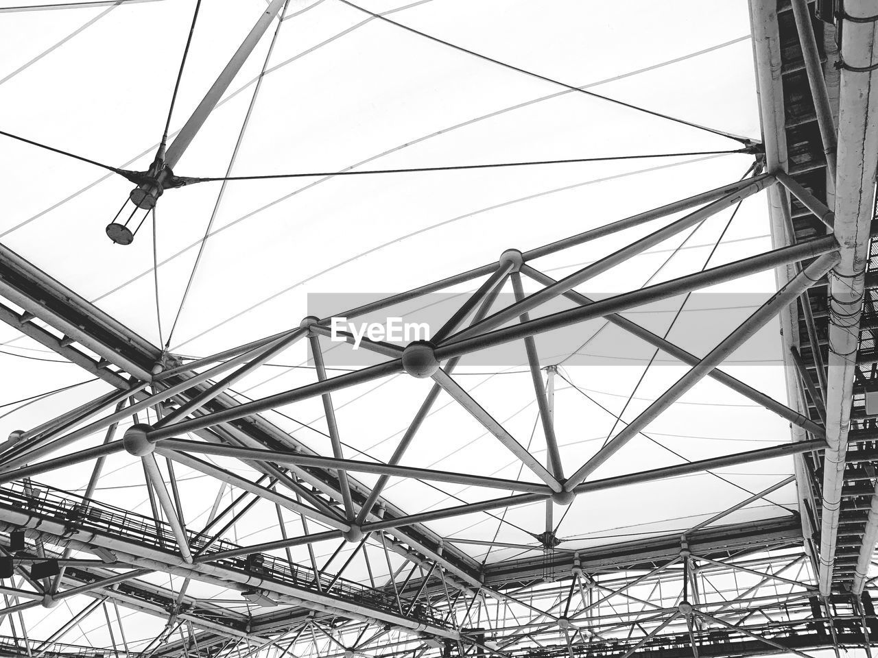 LOW ANGLE VIEW OF POWER LINES AGAINST SKY