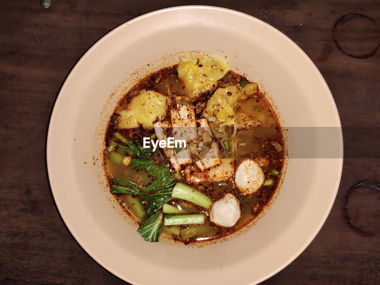 Directly above shot of soup served on table