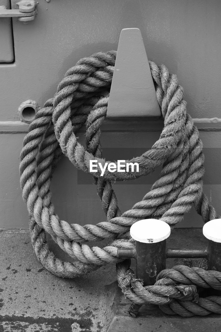 Close-up of rope tied on metal