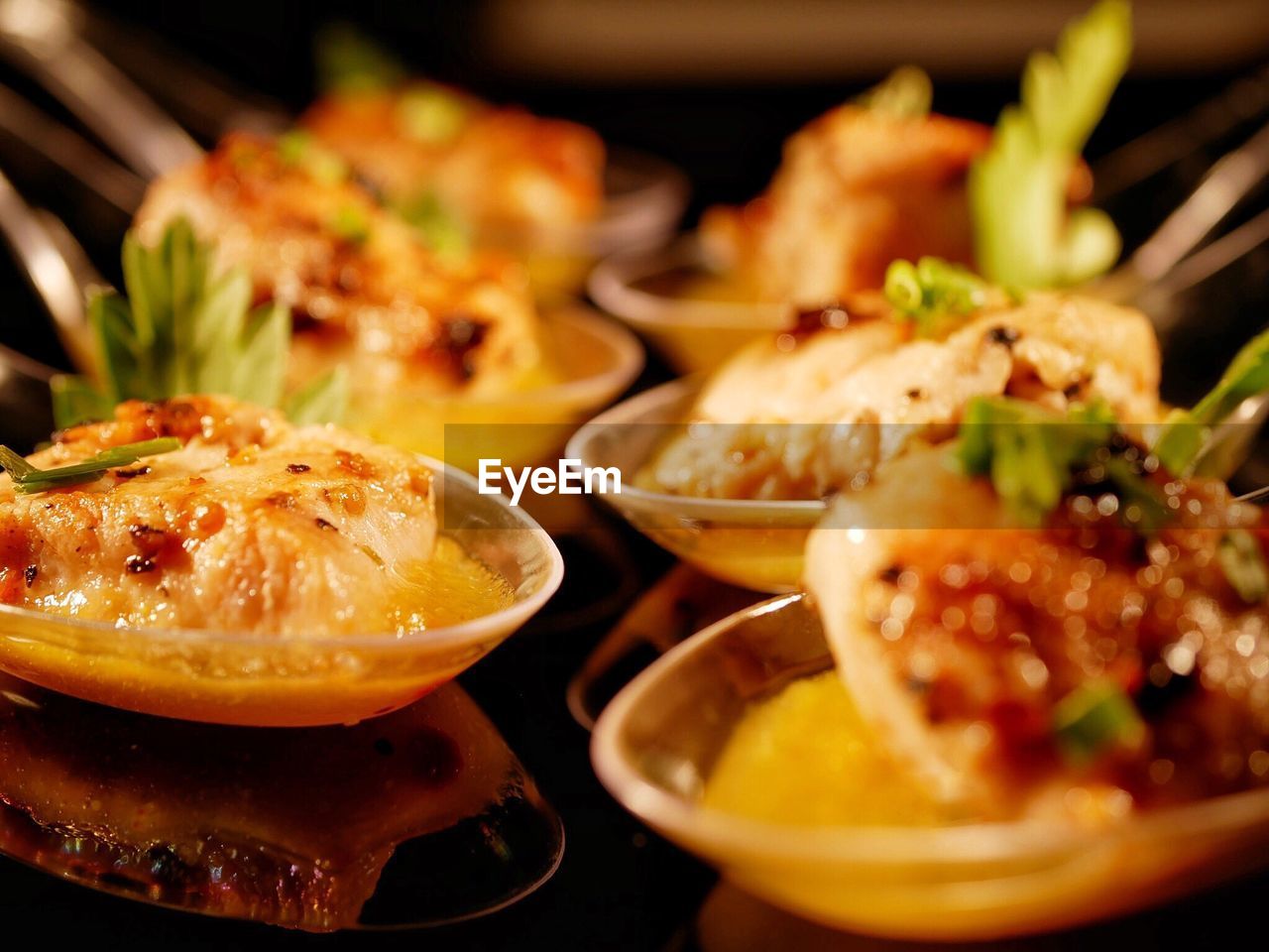 Close-up of food in spoons on table