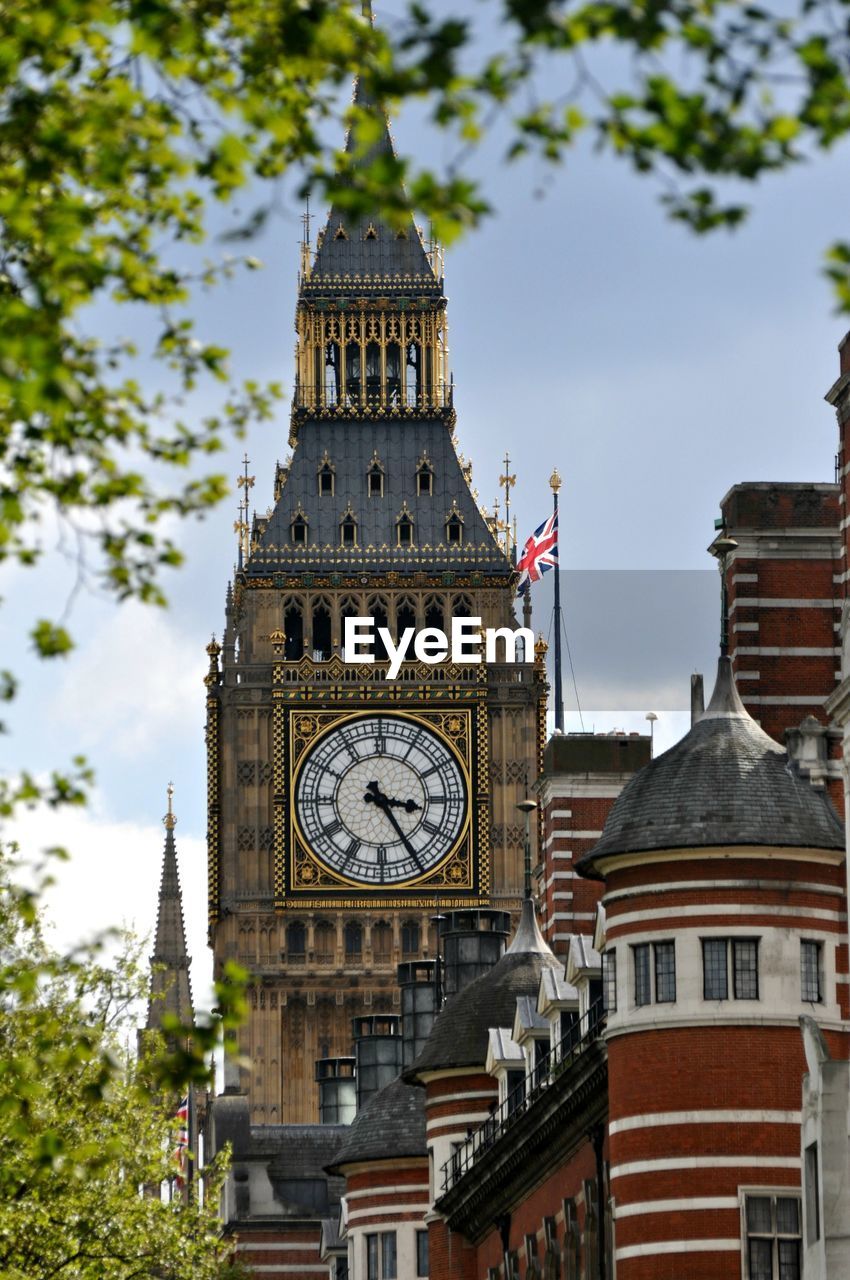 Low angle view of big ben against sky in city